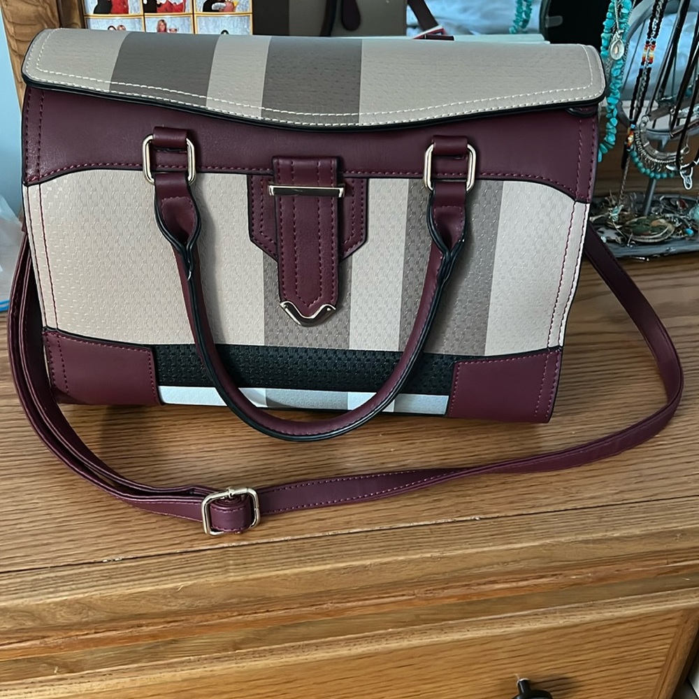Beige, maroon, black, with gold accent.
